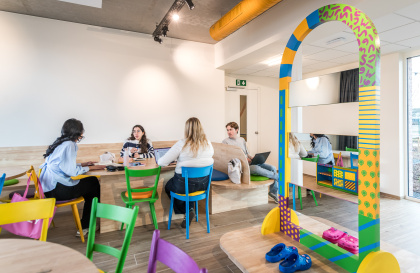 Students studying together in the study café of Wing Upkot in Ghent.